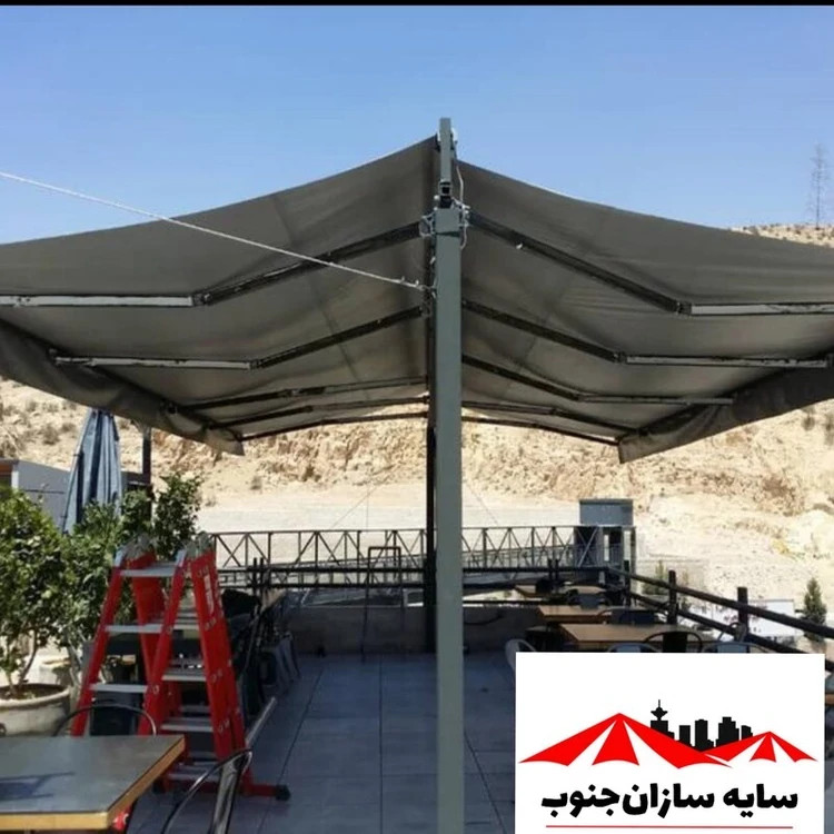 سایبان بازویی متحرک برقی و دستی با اسکلت المینیومی و رنگ کوره و روکش 2 رو کره ایی قیمت بر حسب متر مربع هست