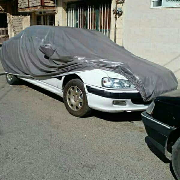 چادر ماشین چهارفصل (ضداب پشت کرک )مناسب خودروهای پراید پژو ساینا 206 تیبا2 رانا سمند کوییک تیبا