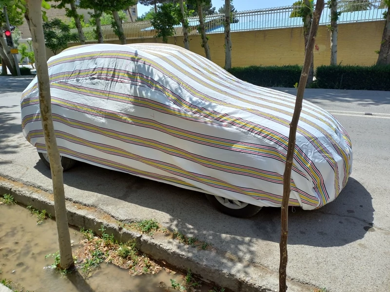چادر ماشین نخی پشت کرکی مخصوص رنو مگان (داخل پنبه ای، ضد خش و مقاوم به آفتاب)(زمینه سفید)